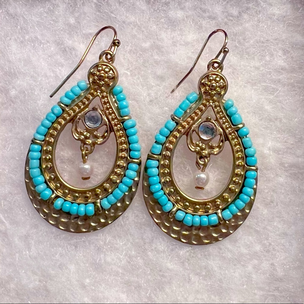 Gorgeous gold-colored earrings with blue beads. Never worn.